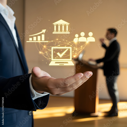Business executive presenting digital strategy icons for growth, teamwork, finance, and project management during corporate conference