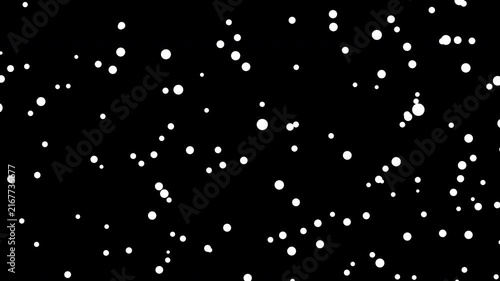 Motion graphics overlay of falling white snowfall dots and winter particle visual effects with alpha channel on a transparent background