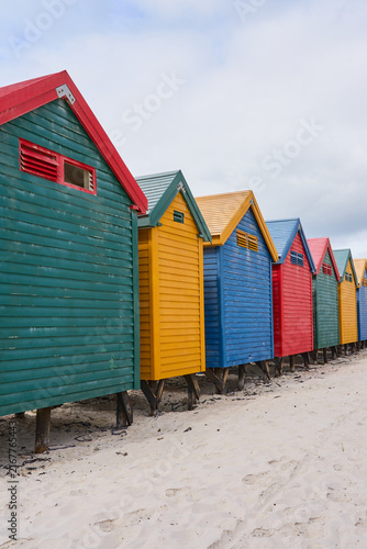 Fotografie Colorful Beach Huts on Sandy Shore at Muizenberg Beach, Iconic Cape Town Coastal