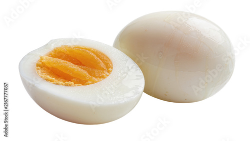 Canvastavla Whole and halved hard-boiled egg with bright yellow yolk, isolated on transparen