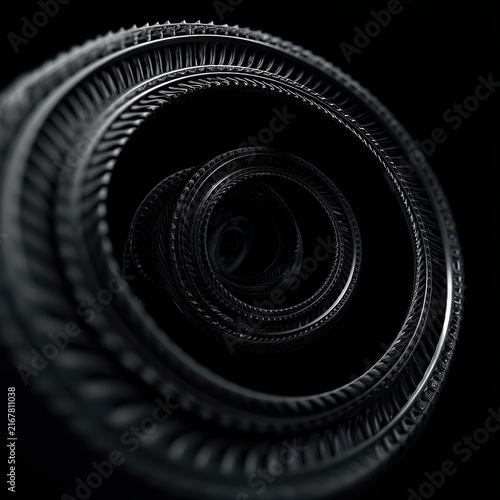 Abstract black and gray spiral gears with detailed texture and depth creating a mesmerizing pattern