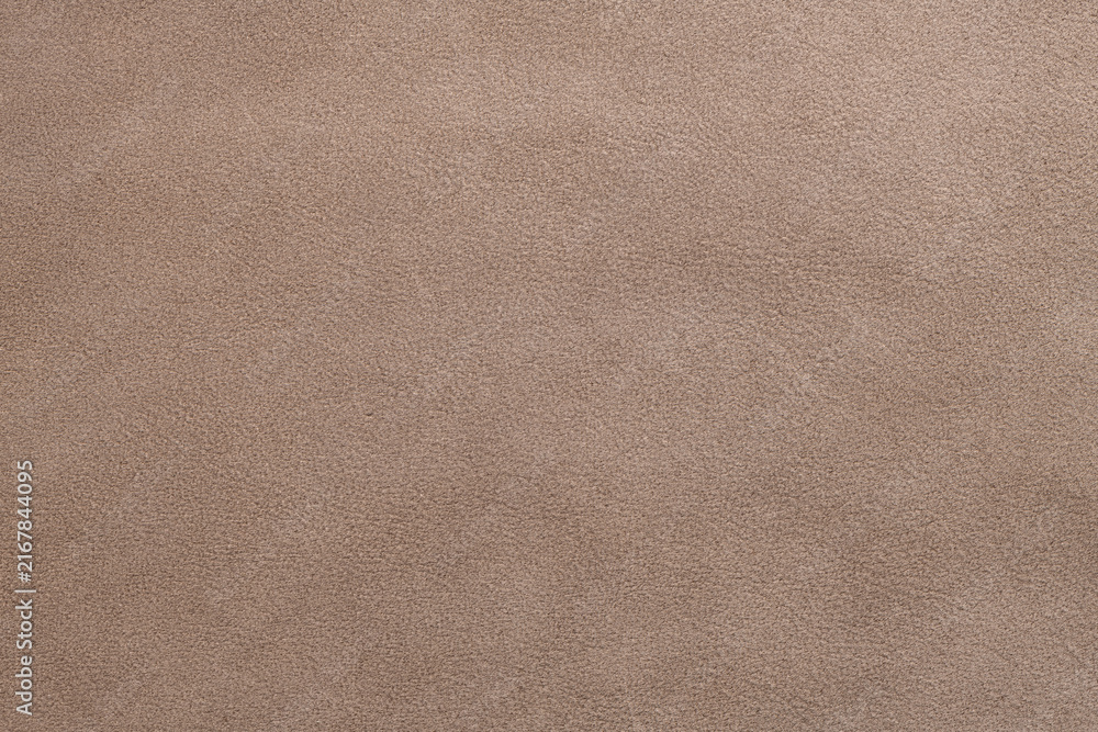 Naklejka premium Close up of brown suede or nubuck leather texture background