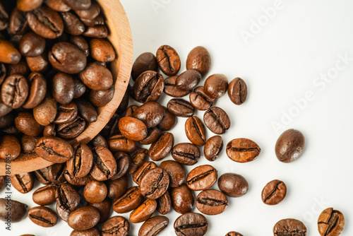 The texture of roasted coffee beans from above is soft light, selected coffee