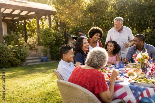 Multigenerational Family Enjoying Labor Day Barbecue