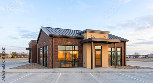 Modern Brick Commercial Restaurant Building with Metal Gable Roof
