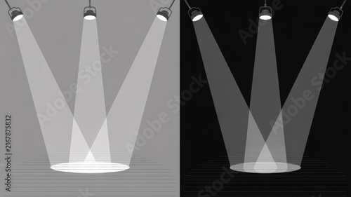 Three stage spotlights illuminating a floor with black and white background