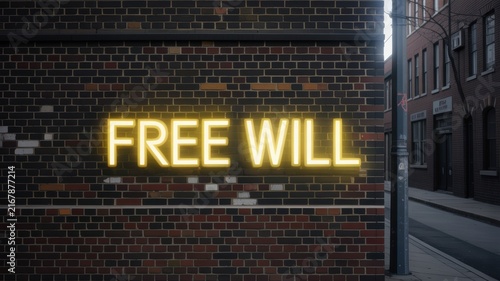 Glowing yellow neon sign saying free will on a brick wall urban background with morning light
