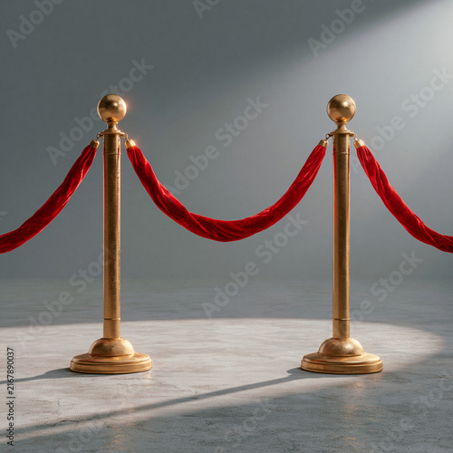 Red velvet vip rope barrier with golden stanchions on concrete floor vip access red carpet
