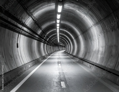 Majestic Empty Tunnel with Modern Architecture and Soft Ambient Lighting in Black and White