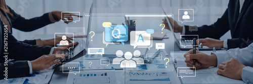 Fotografie Professionals Engaged in Collaborative Meeting with Digital Interface and Communication Icons on Tabletop in Modern Office Environment