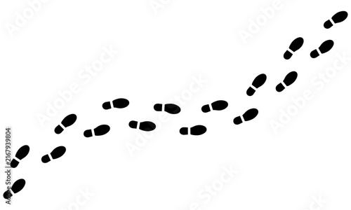 Set of black shoe footprints walking in a curved path