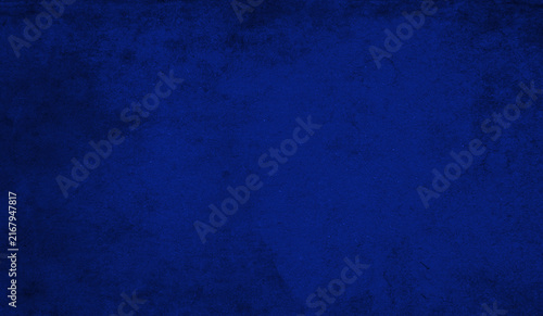 Dark cobalt blue texture with a matte surface, subtle grain and tonal variations. Intense abstract background for design, branding and creative projects.