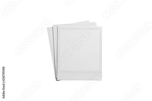 A stack of three empty white instant frames with square borders, isolated on a black background, for and memory concepts