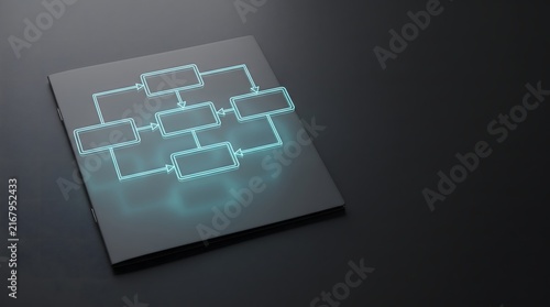 Glowing blue flowchart diagram projected on a black notebook cover for business process management and workflow planning