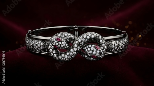 Exquisite Diamond and Ruby Snake Bangle Bracelet on Luxurious Red Velvet