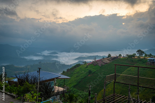 Obraz na płótnie Breathtaking sea of fog over green mountains in the morning at Mon Mork Tawan, Phop Phra, Tak, Thailand