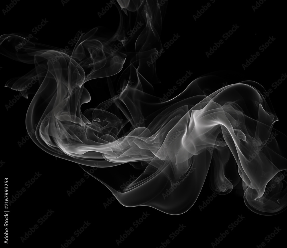 Fototapeta premium White ethereal smoke wisps dance across deep black background creating flowing abstract patterns and textures perfect for artistic overlay design or cinematic visual atmosphere.