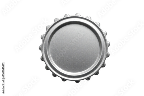 Metallic bottle cap with serrated edges