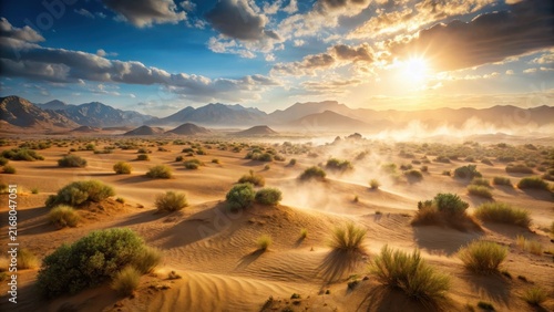 Dusty desert landscape dry sandy ground with windblown haze and atmospheric perspective