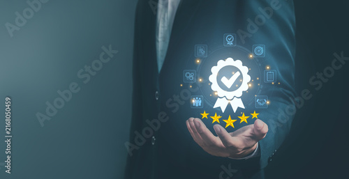 Business quality assurance concept with a professional presenting a digital certification badge, checkmark and stars, symbolizing trust, compliance, quality control and customer satisfaction.