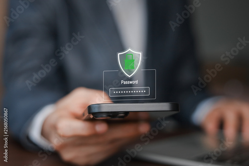 Businessman using smartphone with secure password login interface, highlighting cybersecurity, mobile authentication, encrypted access, identity protection, digital privacy, online account security.