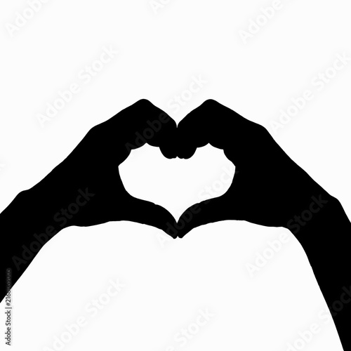 Hands Forming Heart Shape Against White Background