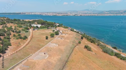 Kilitbahir, Turkey. Mecidiye Bastion, earth-covered Ottoman fortress with stone gun emplacements, aerial flyover along the Dardanelles Strait under clear summer sky. Aerial View