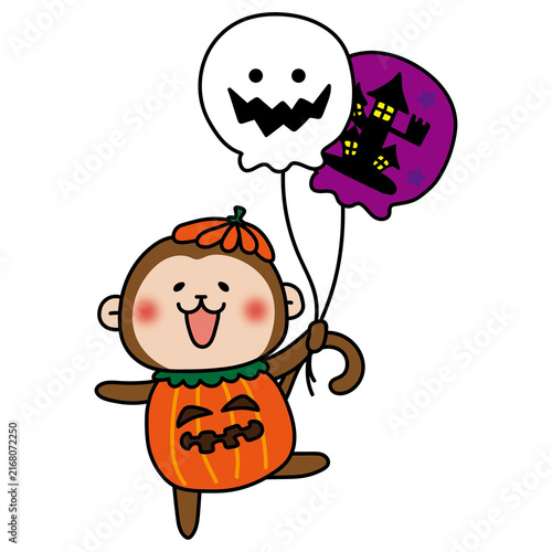 ジャックオランタンの仮装をしてハロウィンの風船を持っている猿