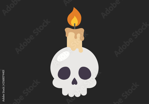 Foto Calavera blanca con una vela encendida encima sobre fondo oscuro