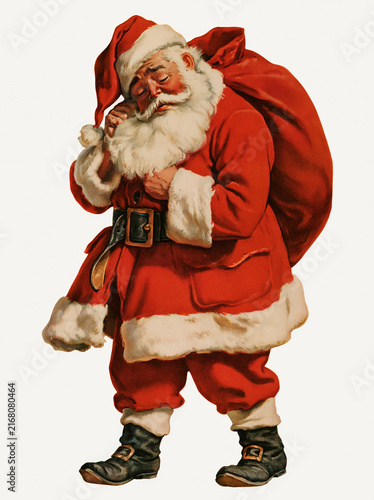 Classic Santa Claus carrying a bag of gifts in a festive pose  