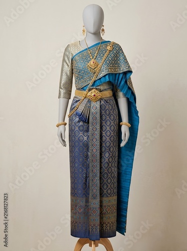 Elegant traditional Thai woman costume. Thai silk. Thai heritage, traditional craftsmanship, luxury textiles, cultural identity, and Southeast Asian fashion. Thai wedding attire, cultural heritage