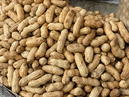 Quadro su tela Pile of Roasted Unshelled Peanuts at Street Food Vendor