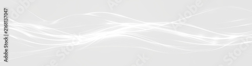 Fotografie Abstract white wave patterns on a light gray background, creating a smooth and f