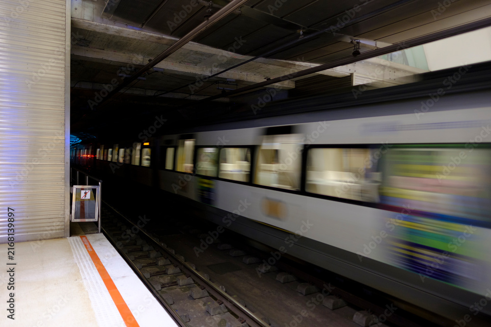 Fototapeta premium High-Speed Metro Entering a Tunnel in Donostia-San Sebastian, Euskadi