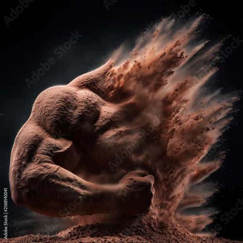 Protein powder forming the abstract shape of muscular dust shaped figure in side chest pose on a dark backdrop