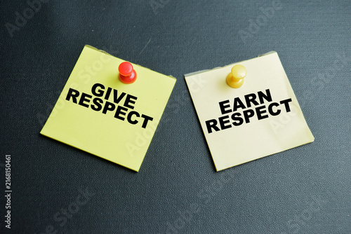 Фотография Concept of give respect and earn respect write on sticky notes isolated on table