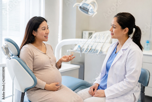 Pregnant Patient Consulting Dentist Before Checkup