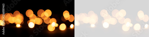 Warm golden bokeh lights overlay on transparent background. Defocused glowing circular lights for Christmas and holiday background design