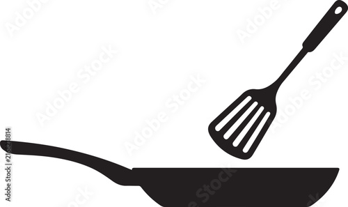 Minimalist silhouette design of a non stick frying pan with a plastic slotted cooking turner spatula