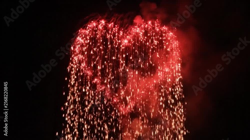 Firework Spout Blooming in Night Sky Dramatic Sparkle Display
