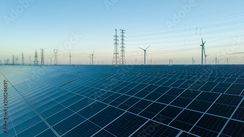 Solar Photovoltaic Farm with Wind Turbines and Power Grid
