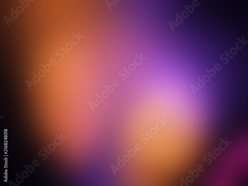 Orange and purple bokeh lights abstract background with soft focus and gradient glow