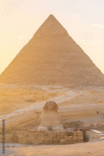 The Great Sphinx and the iconic Pyramid of Khafre in the Giza desert landscape