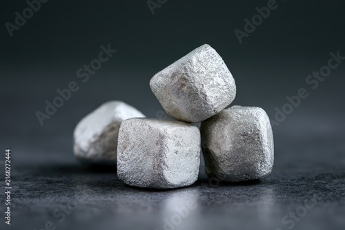 Stacked Rubidium Metal Cubes with Silvery Textured Sheen