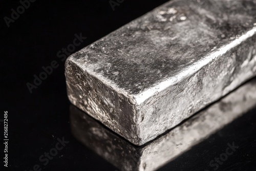 Tin Ingot Bar with Silvery Casting Marks on Black