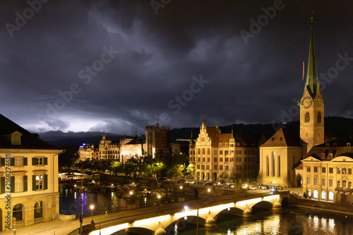 Photography A view over Zurich’s old town during a thunderstorm