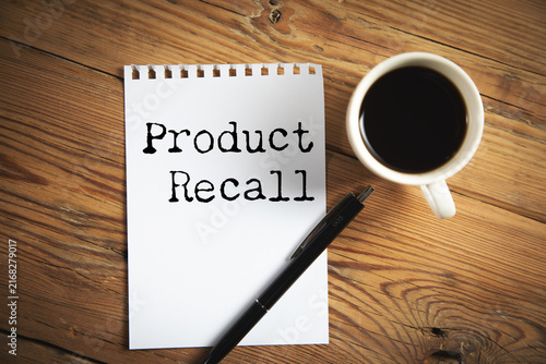 Canvas Print A notebook with product recall text