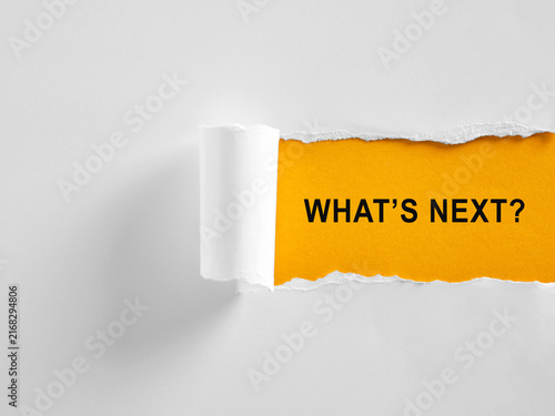Torn paper revealing what's next Concept