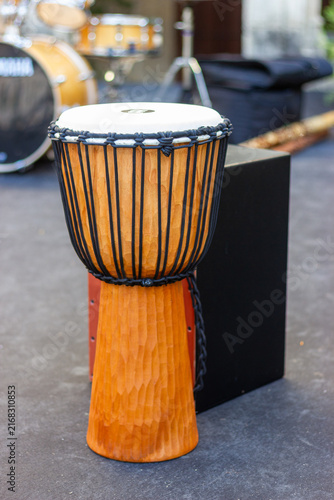 Quadro su tela African hand-carved djembe drum and wooden flamenco box drum.