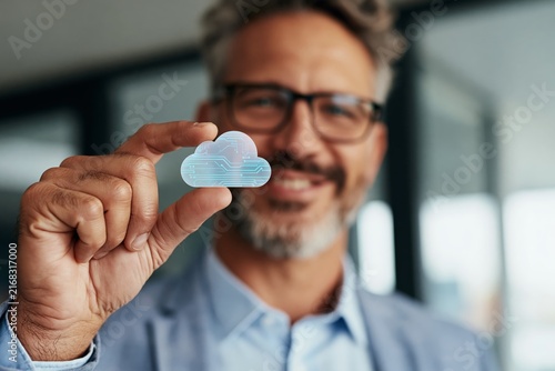 Businessman presenting a cloud computing icon